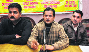 Members of the All J&K Agricultural Technocrats Association address a press conference in Jammu on Monday.