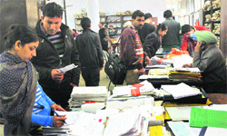 Students at the University School of Open Learning, Panjab University, to get their duplicate roll numbers. Tribune photo: Pradeep Tewari 