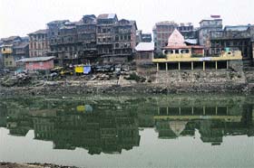 Houses of Kashmiri Pandits on the banks of the Jhelum in Habba Kadal locality in Srinagar
