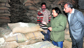 Minister for Consumer Affairs, Qamar Ali Akhoon, during a surprise visit to a FCI godown in Jammu on Tuesday.