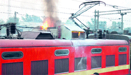 Fire in the overhead equipment of the electric engine of the Shan-e-Punjab Express at the Ludhiana railway station on Tuesday.