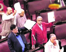 A TV grab of a scene in the Rajya Sabha on Tuesday. 