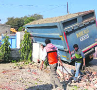 A truck hit the boundary wall of a house in Behrampur village of Ropar. 