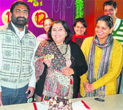 In a rare instance, principal Neera Sharma along with the staff of DAV Public School, Lawrence Road, celebrates 12-12-12 in Amritsar on Wednesday. 