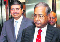 SEBI chairman UK Sinha (R) with Kotak Mahindra Bank MD Uday Kotak in Mumbai.  PTI
