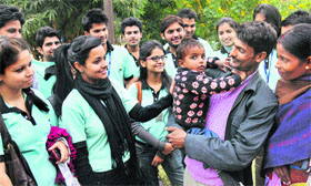 Members of Nav Sankalp with two-year-old Ajit at the PGIMER in Chandigarh on Thursday.