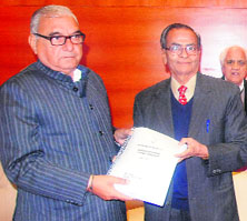 CM Bhupinder Singh Hooda with chairman of state backward classes commission Justice KC Gupta.