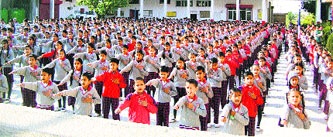 Students of Noorpur Public Senior Secondary School being administered an oath for their commitment to character-building in Nurpur on Wednesday.