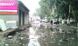A view of a clogged drain in Poonch town. 