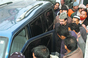 Chairman of the moderate Hurriyat Conference Mirwaiz Umar Farooq leaves for New Delhi from his party office at Rajbagh in Srinagar on Wednesday.