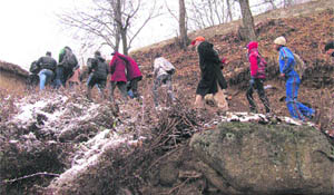 Students trek in the picturesque Zabarwan hill range in Srinagar on Wednesday. 