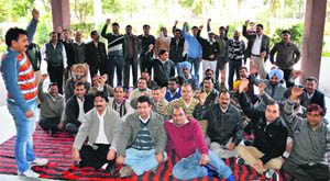 Income tax employees stage a protest in Ludhiana on Wednesday. 