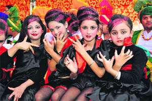 Students pose during the annual function of Spring Dale Public School in Ludhiana. 