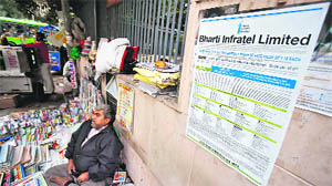 An advertisement for Bharti Infratels IPO posted on a wall in New Delhi on Thursday. 