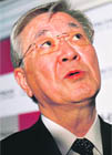 Hitachi president Hiroaki Nakanishi talks to journalists after his news conference in New Delhi on Thursday. 