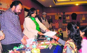 Participants in a handicrafts training programme being given certificates by the Indian Institute of Entrepreneurship in association with the Kamala Mahila Handicrafts Vikas Society in Dehradun on Thursday.