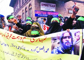 Members of the Jammu and Kashmir Mass Movement during a protest in Srinagar on Thursday