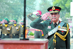 Lt-Gen Sanjeev Anand, GOC, Chetak Corps, pays tributes to martyrs of the 1971 war at the Amar Shaheed Jyoti on the occasion of Vijay Diwas, in Bathinda military station on Saturday.