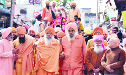 Saints lead the funeral procession of Mahant Mitra Prakash Singh of Shri Nirmal Panchayati Akhara in Haridwar on Saturday. Tribune photo: Rameshwar Gaur