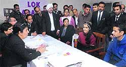 Litigants at a lok adalat in Jalandhar on Saturday