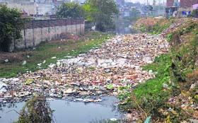 Solid waste dumped in the nullah