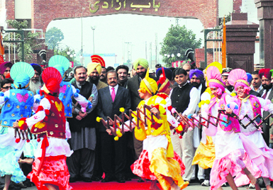 A Pakistani delegation being welcomed at the Attari-Wagah joint check post on Saturday. 
