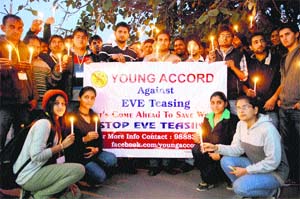 Members of an NGO take out a candlelit march against eve-teasing at Sector 7, Panchkula, on Sunday.