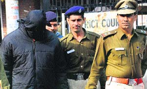 The accused at the district courts in Sector 17, Chandigarh, on Sunday. 