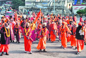 Saints go marching: Saints of Nirvani Akhada head towards Haridwar railway station via Link Express to attend the Maha Kumbh fair in Allahabad beginning from January 24 in Haridwar on Sunday.