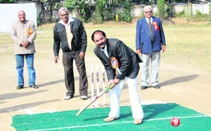Congress legislator Rajkumar plays a shot to inaugurate the Banke Lal Shah Memorial Cricket Tournament in Dehradun on Sunday.