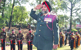Brig Satinder Singh salutes on Vijay Diwas at the War Memorial in Dharamsala on Sunday.