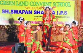 Students present an item during the annual prize distribution function at Greenland Convent School in Ludhiana on Sunday