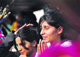 A devotee offer prayers