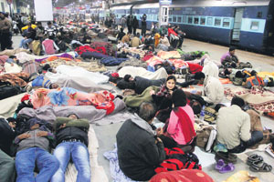 Passengers left stranded in cold weather at a railway platform as train services were affected due to fog in Allahabad on Sunday morning.