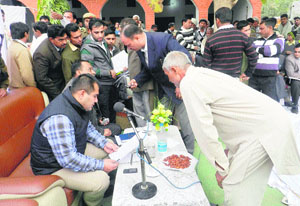 DC Shekhar Vidyarthi during a camp hears a villagers problems at Banondi village in Ambala district.