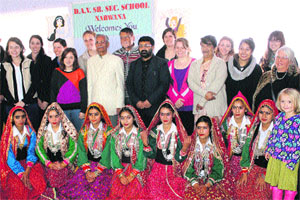Students from the University of Denver, USA, with those of DAV School, Narwana, near Dharamsala on Monday.