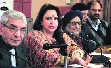 General secretary of the Shri Baba Harivallabh Sangeet Mahasabha Purnima Beri, along with OP Seth and Director SS Ajimal, addresses a press conference in Jalandhar on Monday.