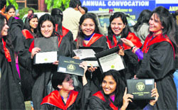 Students in a cheerful mood after the convocation ceremony at the PAU in Ludhiana on Monday.