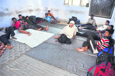 Players, who have come to participate in the National School Games, rest in a room at Government Model School, Cemetry Road, Ludhiana on Monday.
