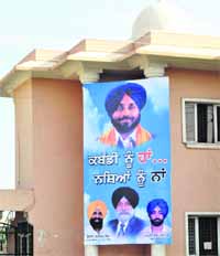 A hoarding with the photograph of Deputy CM Sukhbir Badal put up outside the Polo Ground.