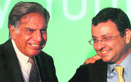 Outgoing Tata Group chairman Ratan N. Tata and his successor Cyrus P. Mistry (R)