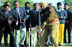 SSP Ravcharan Singh Brar plays a shot as an open cricket tournament began at the Police Public School in Bathinda on Tuesday