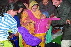 The union says that the health of Jasbir Kaur (above), who has been on hunger strike for 21 days and was taken to hospital at least twice during the last week, will become worse by December 26