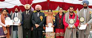 Sports teachers from government schools in the district being felicitated by Prof Surjit Singh (third from left) of Government Rajindra College during a function held at Senior Secondary School, Multania in Bathinda. Also seen in the picture is DEO (Secondary) Hardeep Singh (fourth from left)