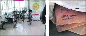 Documents from the CBSE office and cycles parked inside the post office.