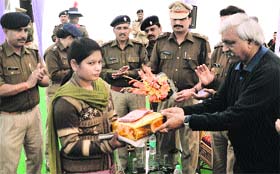 Kavita Yadav being honoured by the Police Department in Dehradun on Tuesday