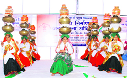 Schoolchildren perform during the inauguration of the Bharat Nirman Jan Soochna Abhiyan at Dharsul Kalan in Fatehabad on Tuesday. A Tribune photograph 