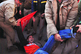 Activists of various trade unions protest against the decision to allow foreign direct investment in retail, in Shimla on Tuesday.