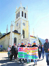 NSS volunteers take out an awareness rally at the Ridge in Shimla on Tuesday. 