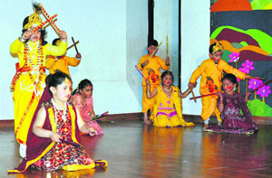 Students of Indus World School perform a dance in Mandi recently.